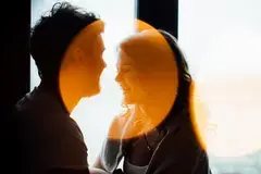 magical light on a smiling couple