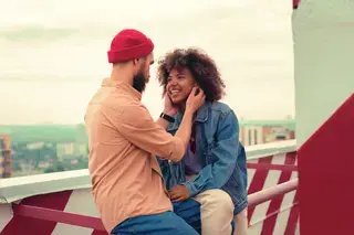 Young happy couple attracted to each other