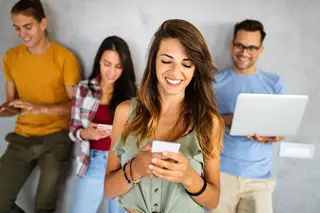 Group of happy friends, smiling and connected by digital devices