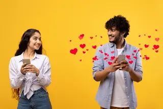 Two friends in front of a yellow backdrop exchanging smiles and playful texts, with animated hearts 