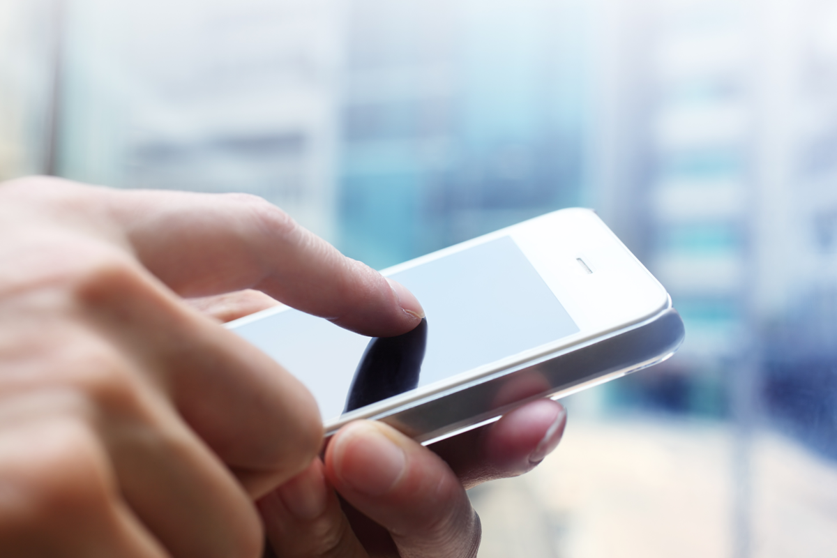 Person texting on smartphone